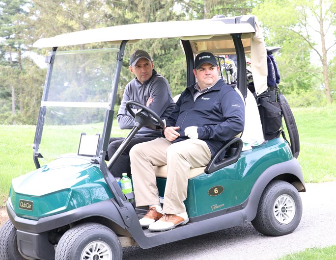 superior credit guys on golf cart
