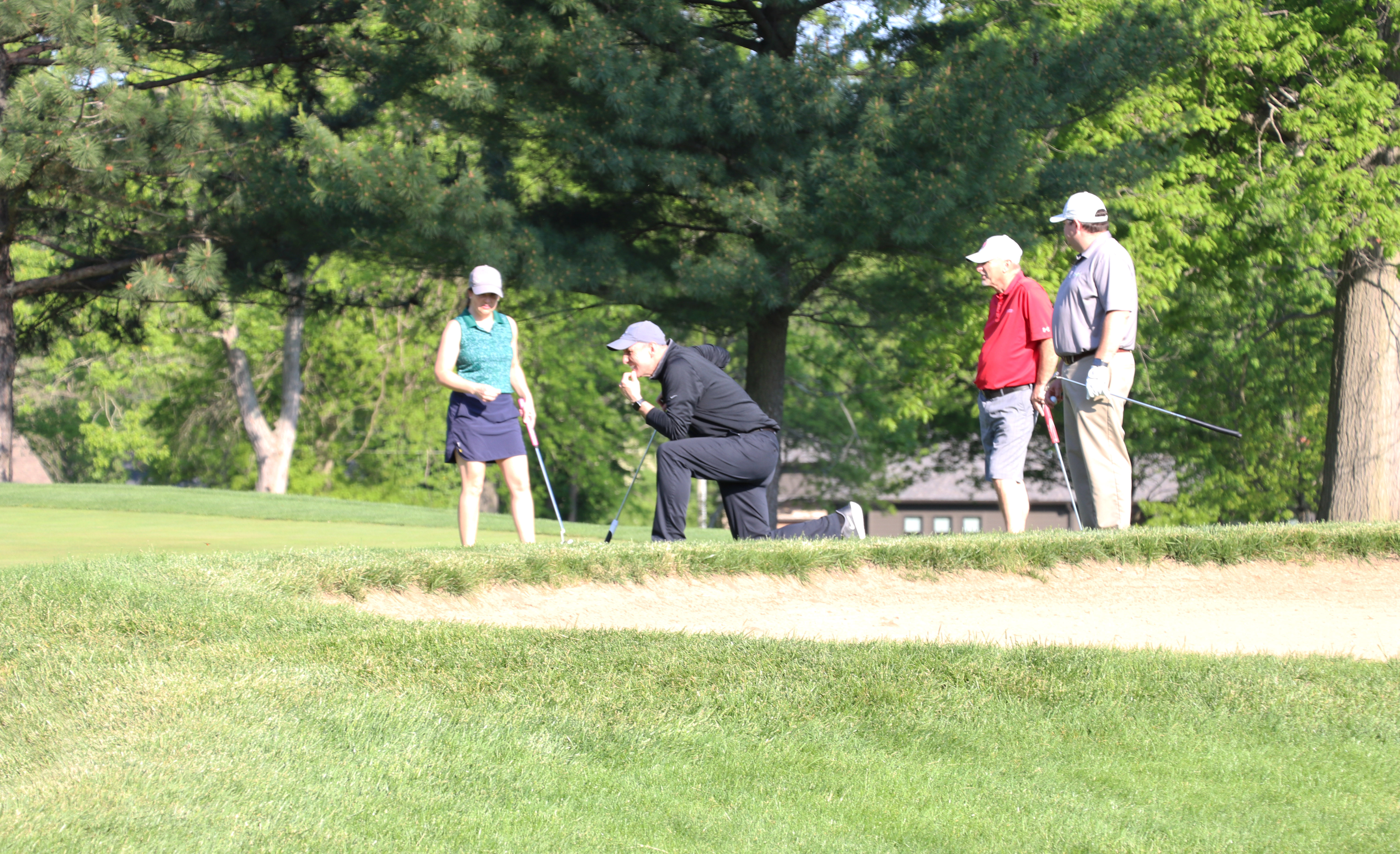 superior credit union golf team on green