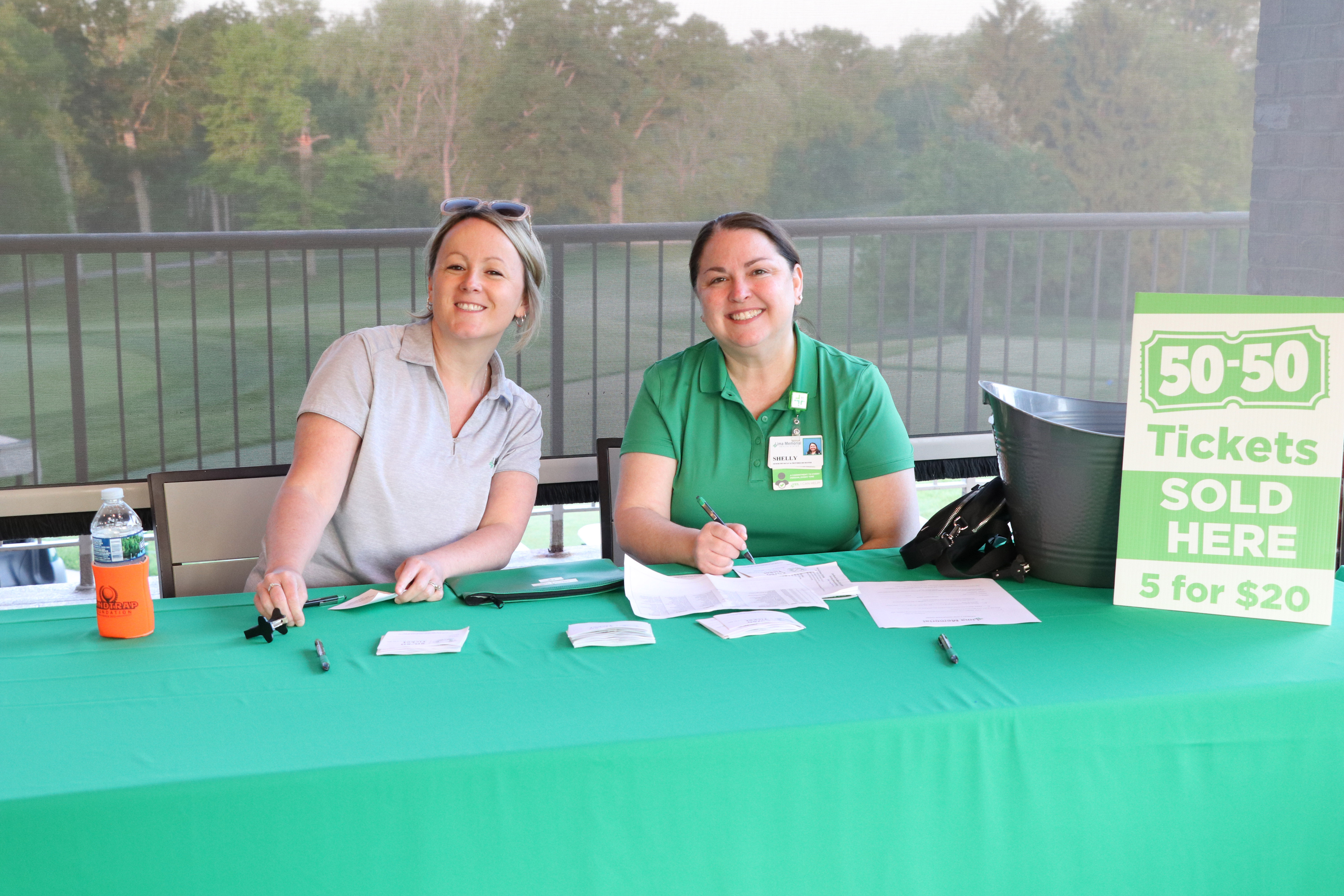 Jessie-Shelly selling 50-50 raffle tickets
