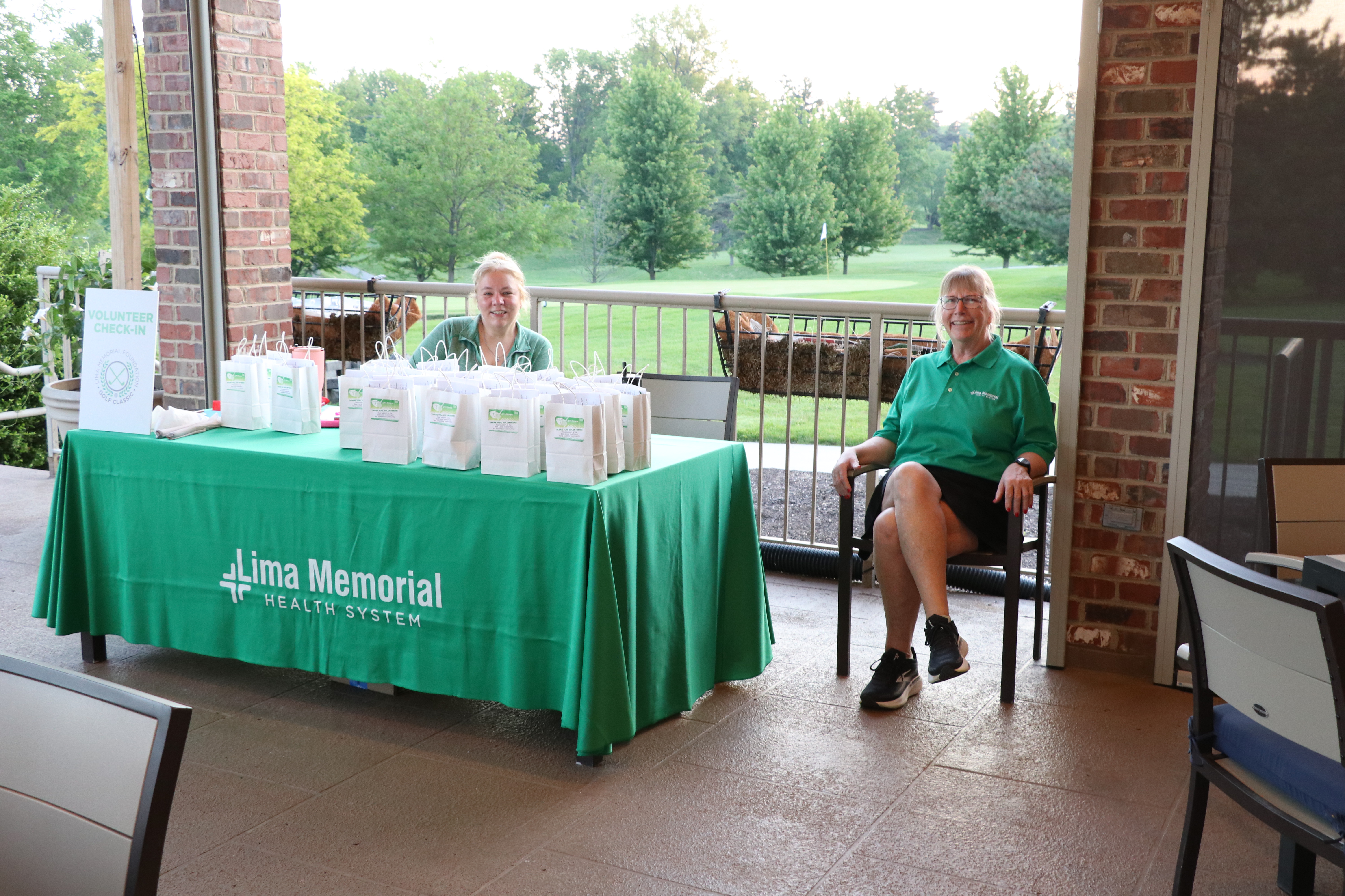 volunteer checkin table with goodie bags